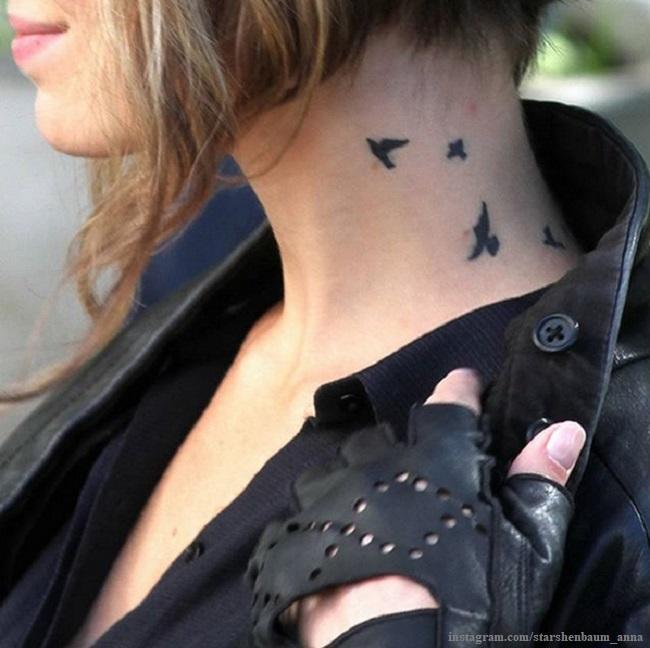 Татуировка на шее Анны Старшенбаум 